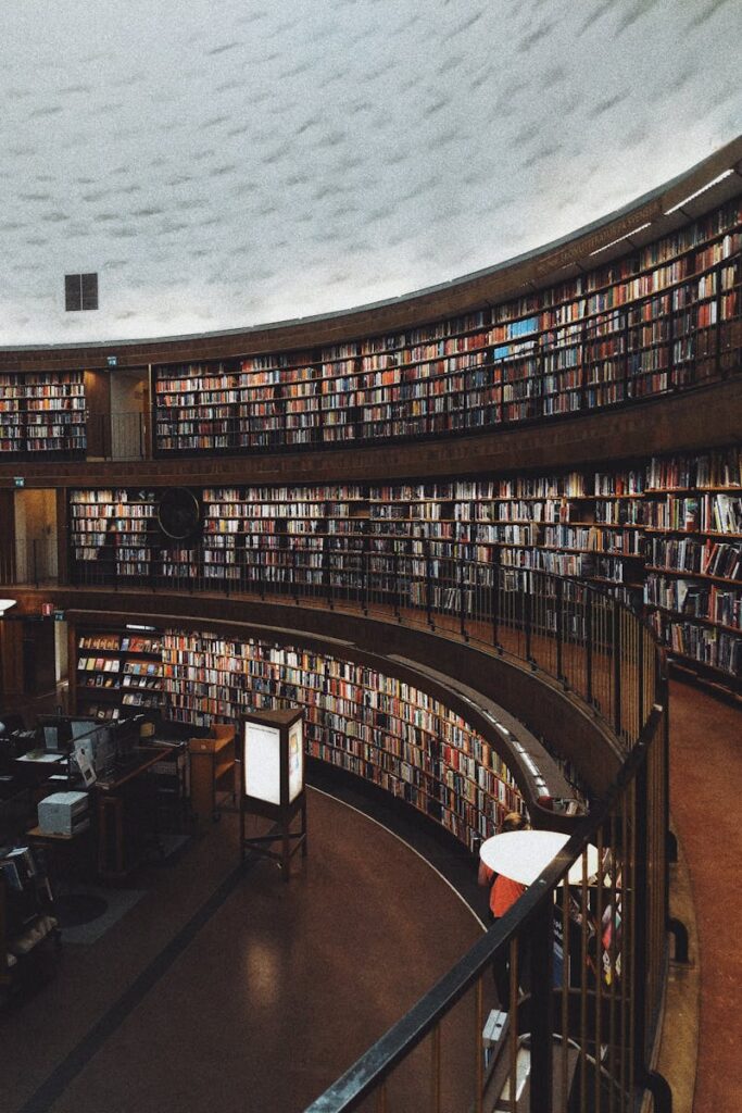 Explore a stunning circular library with endless bookshelves, offering a haven of knowledge and tranquility.